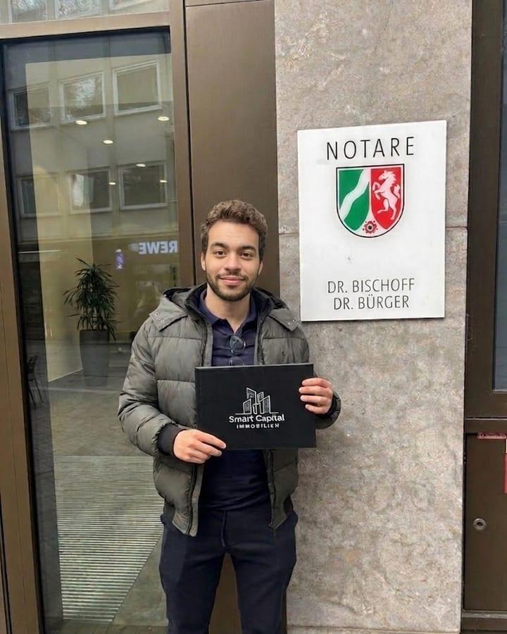 A SmartCapital buyer outside the notary's office on completion day
